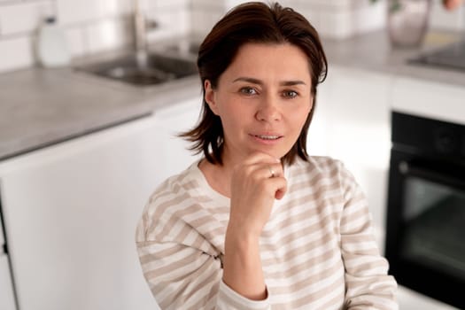 Cheerful Young Woman At Home In Bright Room