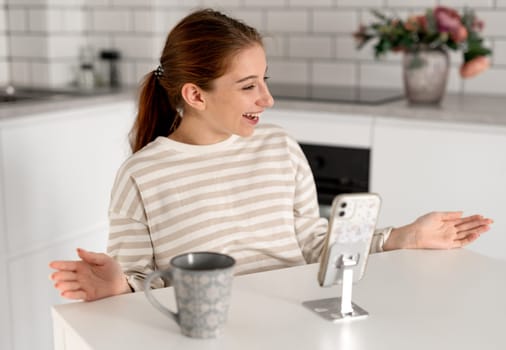Happy Girl Chatting On Video Call From Smartphone