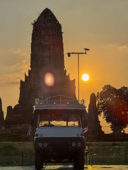 Bangkok, Thailand - November 11, 2024: Sunset over Wat Chaiwatthanaram Ayutthaya historic temple, ancient beautiful brick towers under a golden sunset. Spiritual heritage, culture and architecture.