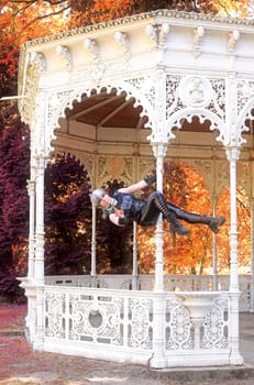 Fantasy shot of a dark elf on the pole of an old pavilion