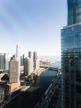 Chicago, Illinois, USA-November 9, 2023-A breathtaking aerial perspective of downtown Chicago, Illinois, captured from a tall building's window.