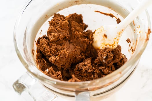 The mixed Chocolate Gingerbread Cookie Dough, thick and rich, ready for shaping. The dough combines deep chocolate and warm spice flavors, perfect for holiday baking.
