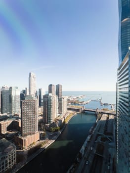 Chicago, Illinois, USA-November 9, 2023-A breathtaking aerial perspective of downtown Chicago, Illinois, captured from a tall building's window.