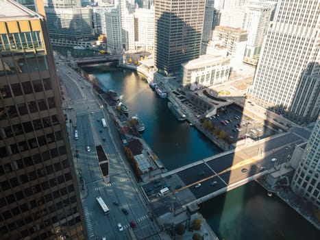 Chicago, Illinois, USA-November 9, 2023-A breathtaking aerial perspective of downtown Chicago, Illinois, captured from a tall building's window.