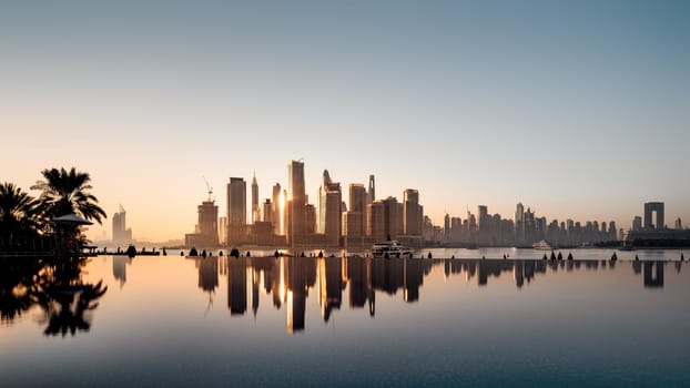 the reflected skyline of the dubai marina during sunrise