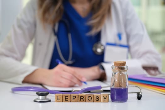 A healthcare professional documenting essential notes on effective leprosy treatment, showcasing their expertise