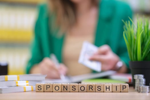 This visual shows the aspects of sponsorship, including paperwork and the financial details involved