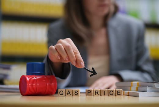 A highly qualified professional evaluates gas prices by utilizing various analytical tools and valuable resources