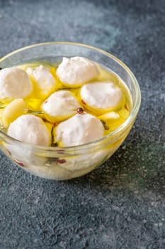 Golden oil swirls around creamy labneh, peppercorns and herbs infuse rustic charm