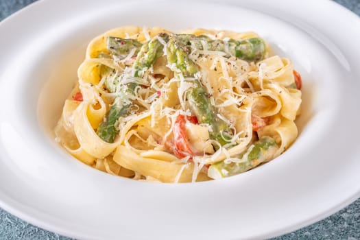 Silky noodles wrapped in sauce, crisp vegetables and cheese complete this comfort dish