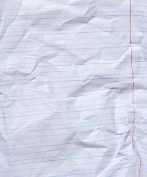 Crumpled sheet of white lined paper with a red border
