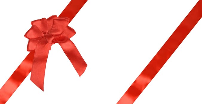 Red gift ribbon and bow on isolated background.