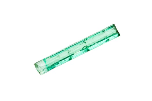 close up of sample of natural stone from geological collection - rough transparent emerald crystal mineral isolated on white background