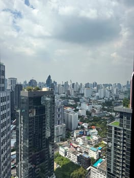 Thailand skyscrapers towers with big windows in the city center, downtown area with breathtaking office buildings and infrastructure. Urban landscape in the metropolis with towers.