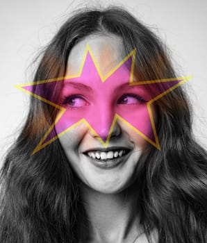 Young woman with long wavy hair smiles warmly while colorful star graphic overlays her face. Soft lighting enhances her joyful expression and modern artistic style.