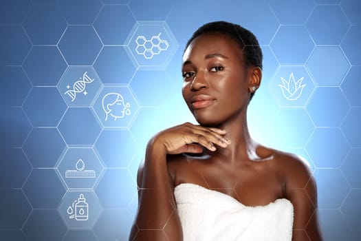 A confident woman poses with a towel wrapped around her, highlighting her healthy skin. Scientific icons representing skincare ingredients are visible in the background, creating a serene atmosphere.