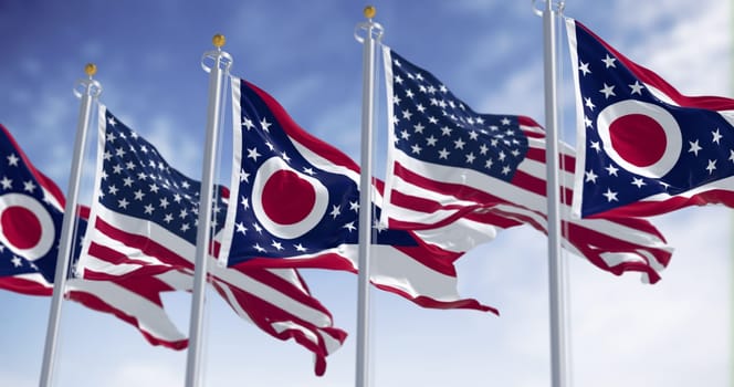 Ohio state flag waving in the wind with the national US flag on a clear day. 3D illustration render. Rippled textile. Selective focus