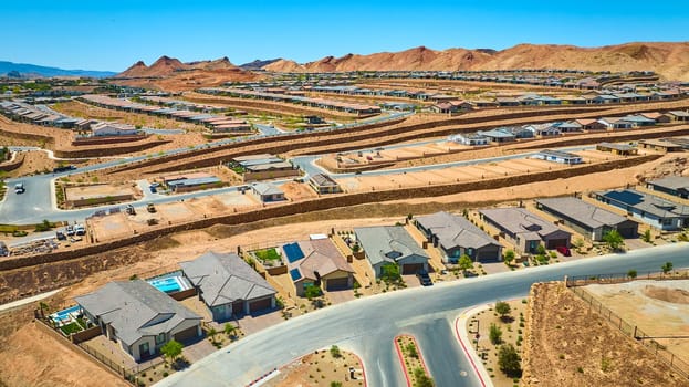 Aerial view of new housing development in Lake Las Vegas Nevada showing modern homes under construction and desert landscape ideal for real estate urban planning and community growth themes