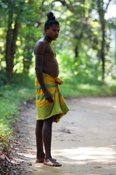 Vedda tribesman of Sri Lanka stands in natural surroundings, representing indigenous culture, traditional lifestyle, and connection to nature. Tribal portrait in native Habitat. 02.03.2022 SRI LANKA.