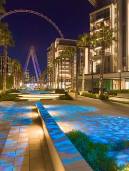 UAE, Dubai, 17 November 2024: The famous largest observation wheel The Eye of Dubai - Ain Dubai at night, Bluewaters island. High quality photo