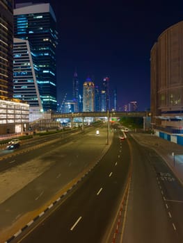 UAE, Dubai, 19 September 2024: architecture of the city at night, skyscrapers with glass facades. High quality photo