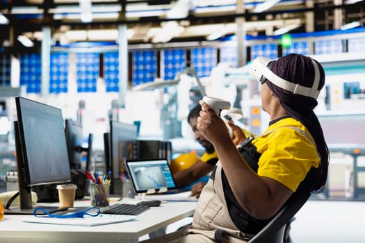 Solar panel plant technician using VR goggles to build generators for renewable energy, metaverse. Industrial factory engineer creates solar power using virtual reality gear, production.