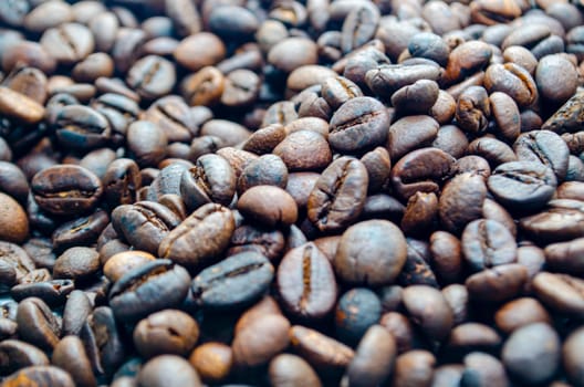 Top view of roasted coffee beans with customizable space for text.