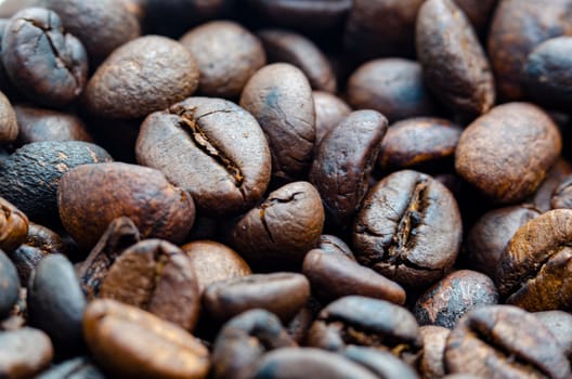 Close up of roasted coffee beans with customizable space for text