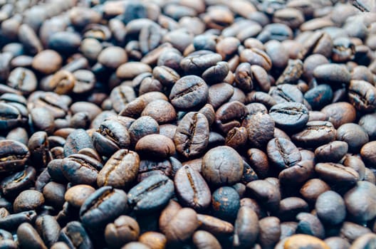 Roasted coffee beans that highlights the texture and surface details of the coffee beans with customizable space for text.