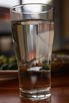Plain Water In A Glass On The Table , Background for advertising and wallpaper in healthcare and drink lifestyle scene.