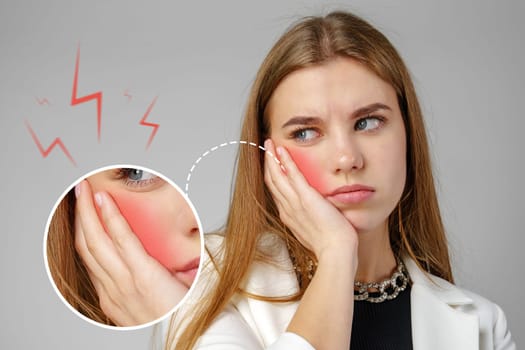 A young woman appears distressed, holding her cheek in discomfort. Visible redness indicates pain, while her expression conveys worry. This moment captures a common dental concern.