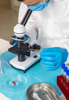 examine blood in the laboratory. Selective focus. medicine.