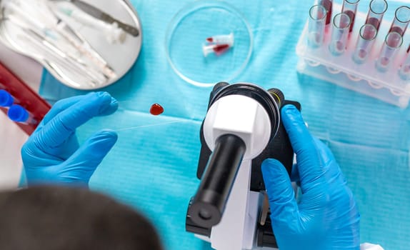 examine blood in the laboratory. Selective focus. medicine.