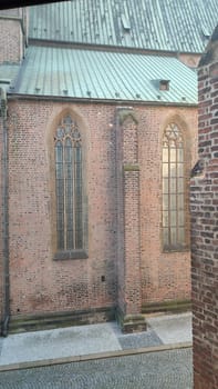 October 22 2024 Hradec Kralove, Czech Republic Europe, Kralov region, Kralovehradecky kraj, Gothic church windows shotlisttravel travel tourism outdoor city centre town architecture . High quality photo building