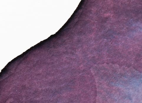 Intricate layers of deep purple watercolor blend seamlessly on textured paper, capturing the artistry of the painting process while highlighting the nuances of color and depth.
