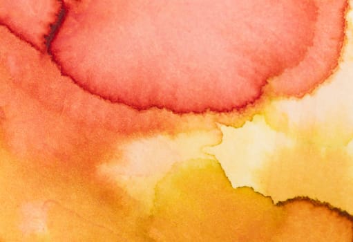 Bright hues of orange and yellow blend seamlessly in this watercolor artwork, creating a vivid abstract representation.
