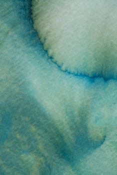 Soft shades of blue blend seamlessly in an abstract watercolor artwork, evoking a sense of tranquility and fluid motion. The gradual transitions invite viewers to appreciate the soothing colors.