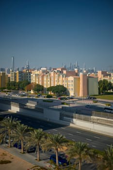 UAE, Dubai, 19 September 2024: architecture of the city at sunset, skyscrapers with glass facades. High quality photo