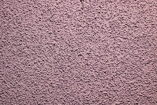 A detailed close up view showcasing the intricate texture of a beautifully soft pink carpet that adds warmth to any space