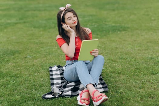Young woman listen to song on music player.