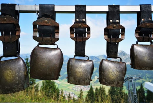Cowbells under a blue sky in the Tyrolean Alps