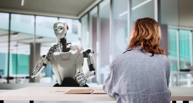 Tech-savvy Woman Solving Code Quizzes With AI Recruiter Robot
