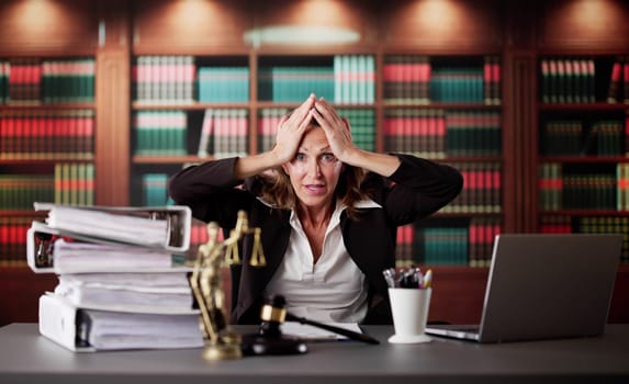 Exhausted Tax Clerk Sorting Invoices In Front Of Computer.