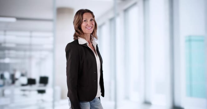 Confident Businesswoman And Happy Coach Standing In Professional Corporate Workplace.