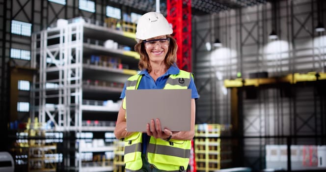 Female OSHA Engineer Ensures Compliance At Rocket Production Factory Inspection.