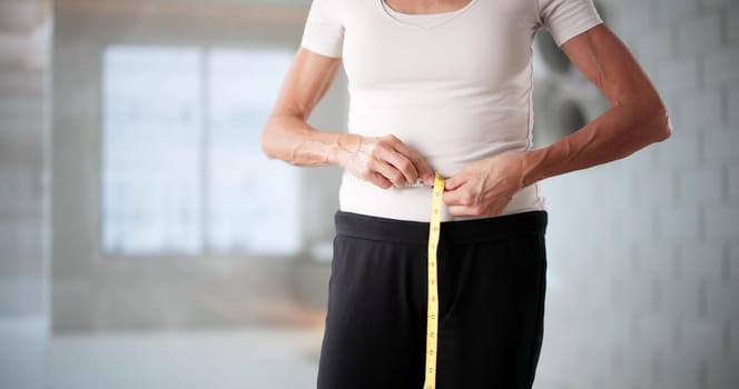 Smiling Woman Measures Waist, Celebrates Weight-loss Journey In Gym