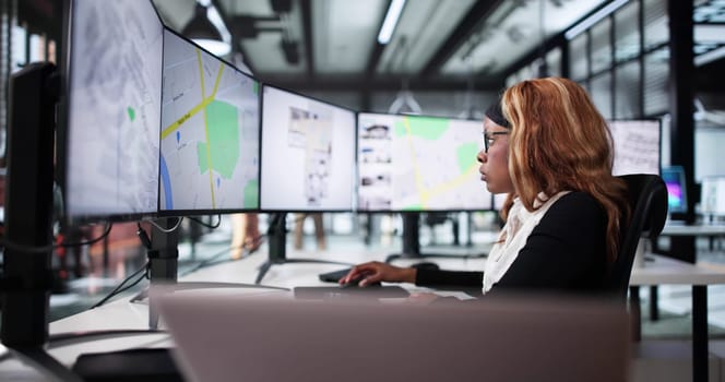 Young Female Real Estate Agent Monitoring Property On Online Map.