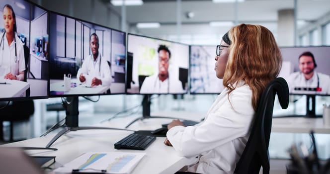 Medical Doctor Conducting Telehealth Webinar With African American Patient