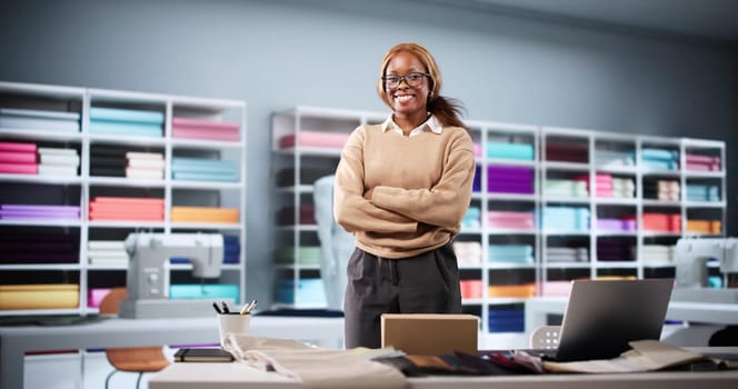 The Professional Designer Portrait Captures A Young African Woman At Work. Tailoring Fashionable Dresses