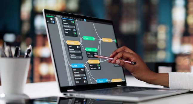 African American Female Engineer Using Realtime 3D Node Editor. Office Meeting.
